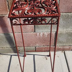 Wrought iron plant 28 in H and 11 in W (Location In Description)