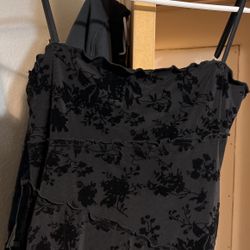 Woman’s Black Dress 