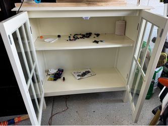 White wood storage cabinet with Glass doors