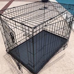 Large animal carrying wire cage.  Dual access wire doors with sliding hinges. Collapsible, carrying handle, removable plastic pan.