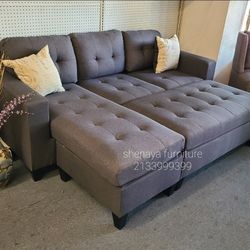 Sectional With Ottoman And 2 Pillows