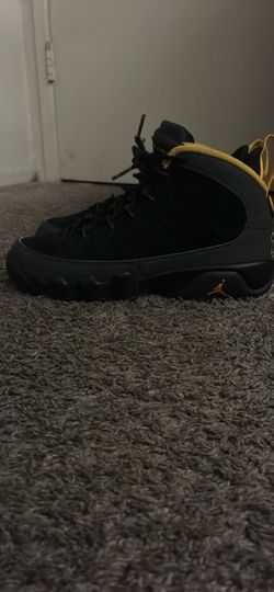 Dark charcoal university gold 9s
