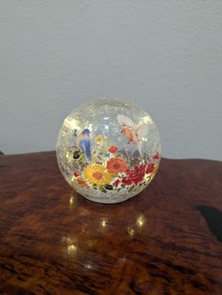 Glass Ball Light Crackle LED Night Light with a flower and bird pattern. 
