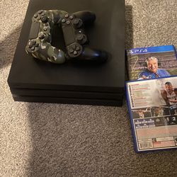 ps4 pro 1tb with madden , 2k 23 and 2 controllers