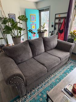 Gray Fabric Sofa with Nailhead Trim