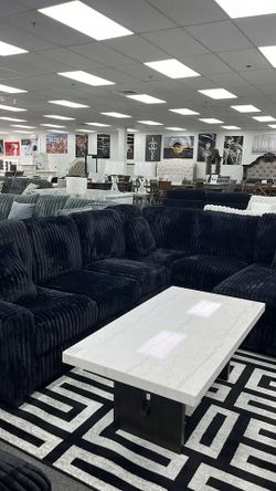 Elevate your living space with this Luxurious black sectional