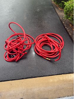 FREE: Two 50 ft rubber hoses