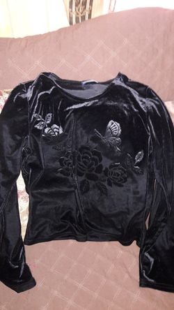 Velvet black long sleeve sweater.