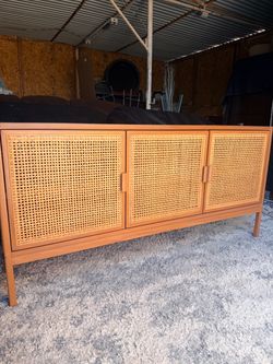 New excellent condition Measures (w54"D15"H26") * Threshold Minsmere TV Stand in natural brown, featuring a wooden frame with distinctive woven cane r