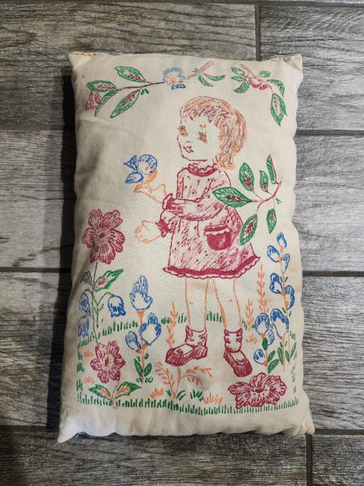 Antique pillow with garden scene