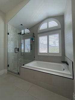 Bathroom tile remodels 48”x48” porcelain tile