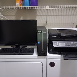computer with keyboard, screen, and printer