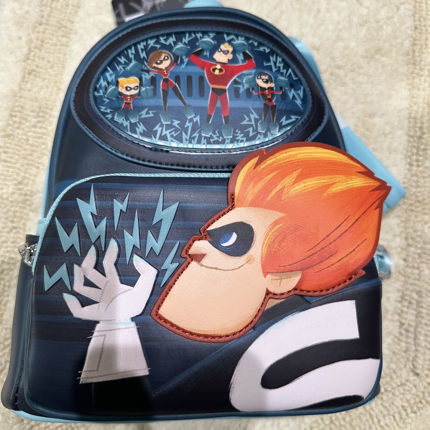 disney pixar incredibles mini backpack Loungefly The Syndrome Glow Made with vegan friendly faux leather Disney Loungefly Mini Backpack -