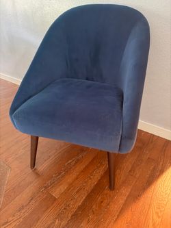 Blue velvet accent chair