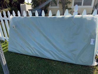 Free twin bed wrapped in plastic & frame curb alert