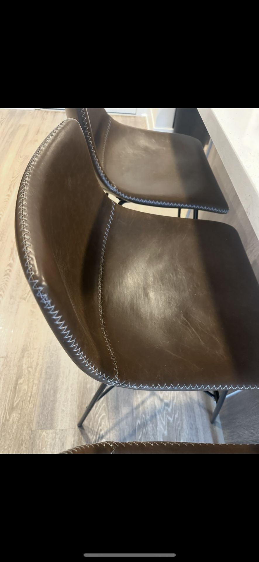 3 brown, leather counter height, stools