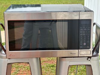 stainless steel LG countertop microwave featuring an "EasyClean"
