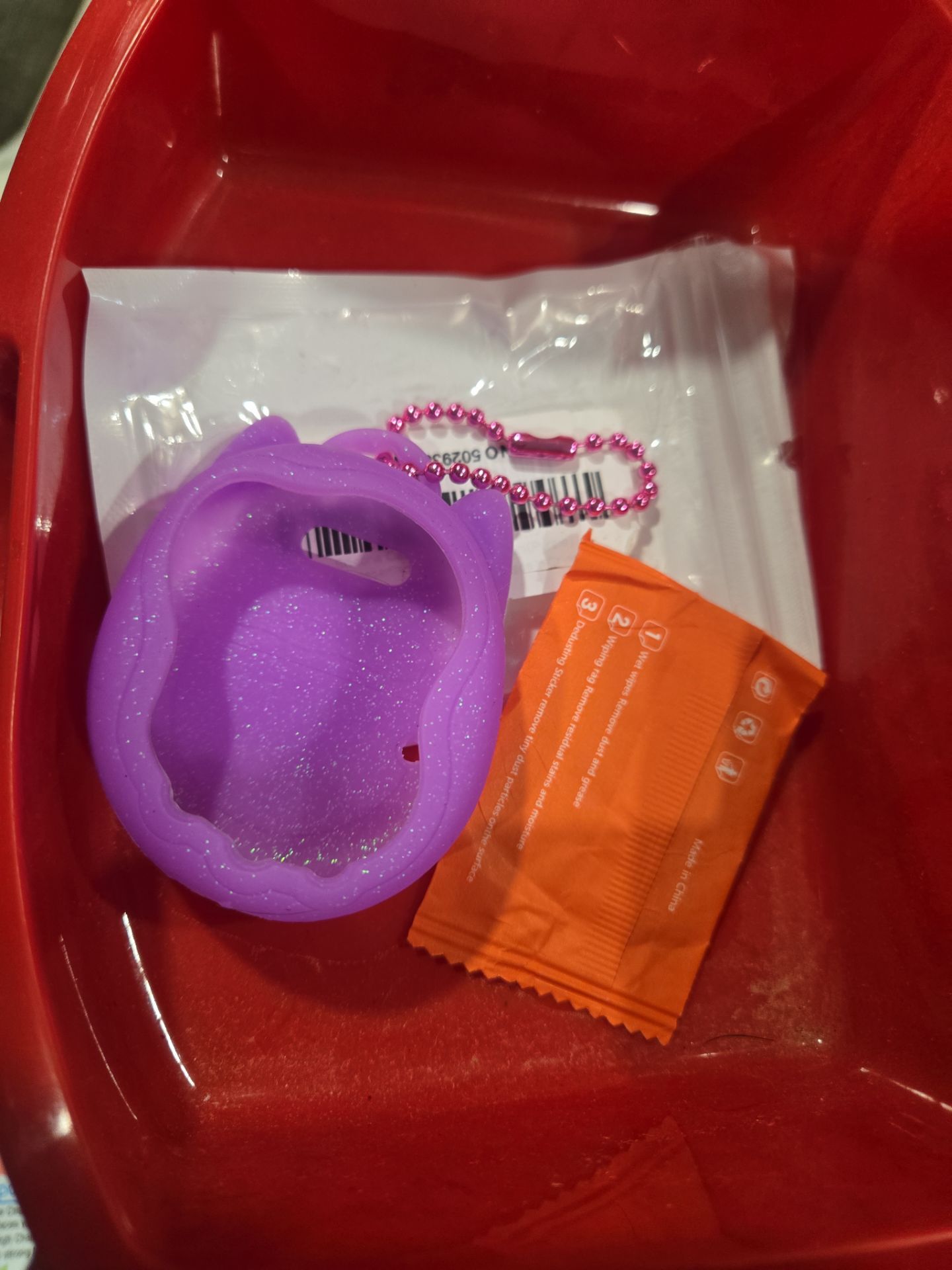 purple glitter silicone cover case for a Tamagotchi Connection or Tamagotchi Paradise)