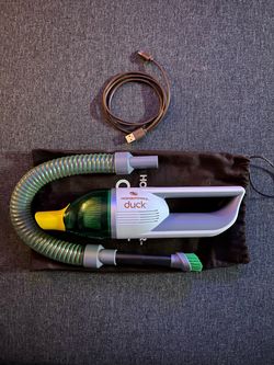 Compact cordless vacuum