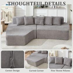 Gray Curved Sectional Sofa with Throw Pillows