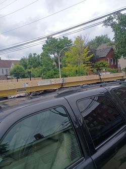 25 ft fiberglass ladder with hooks and extendable feet