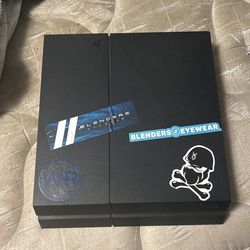 PS4 with 2 Controllers & Games