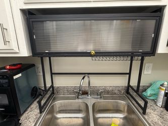 over-the-sink dish drying rack with a dustproof cabinet
