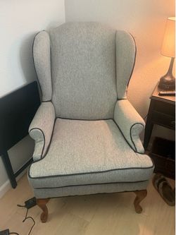 Grey wingback chair