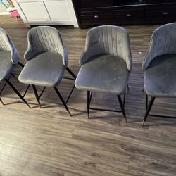 A Set Of 4 High Stool Chairs