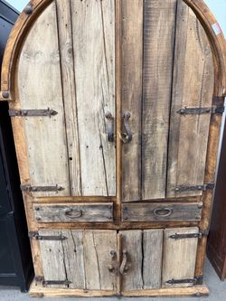 Rustic Arched Wood Cabinet with Iron Hardware