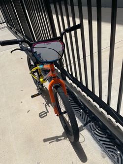 Orange,yellow, and bule bike for boys and girls