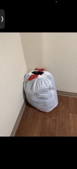 Bag of clothes, mostly teen.