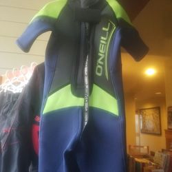 Brand new. Kids wet suit, size 4