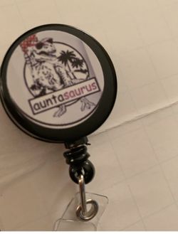 Auntasaurus badge reel