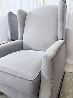 Charcoal gray pushback reclining chairs