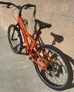 Giant XtC Jr 24 Lite youth mountain bike in vibrant orange