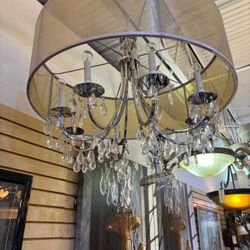 Beautiful modern chandelier.   Has all the hanging crystals, not fully showed in photo… 32” aroung , x 21” high   $300