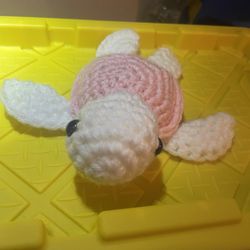 Pink and white crochet turtle