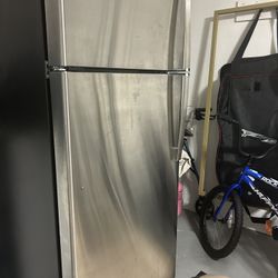 Two Refrigerators: GE/Stainless Steel/ Kenmore / White