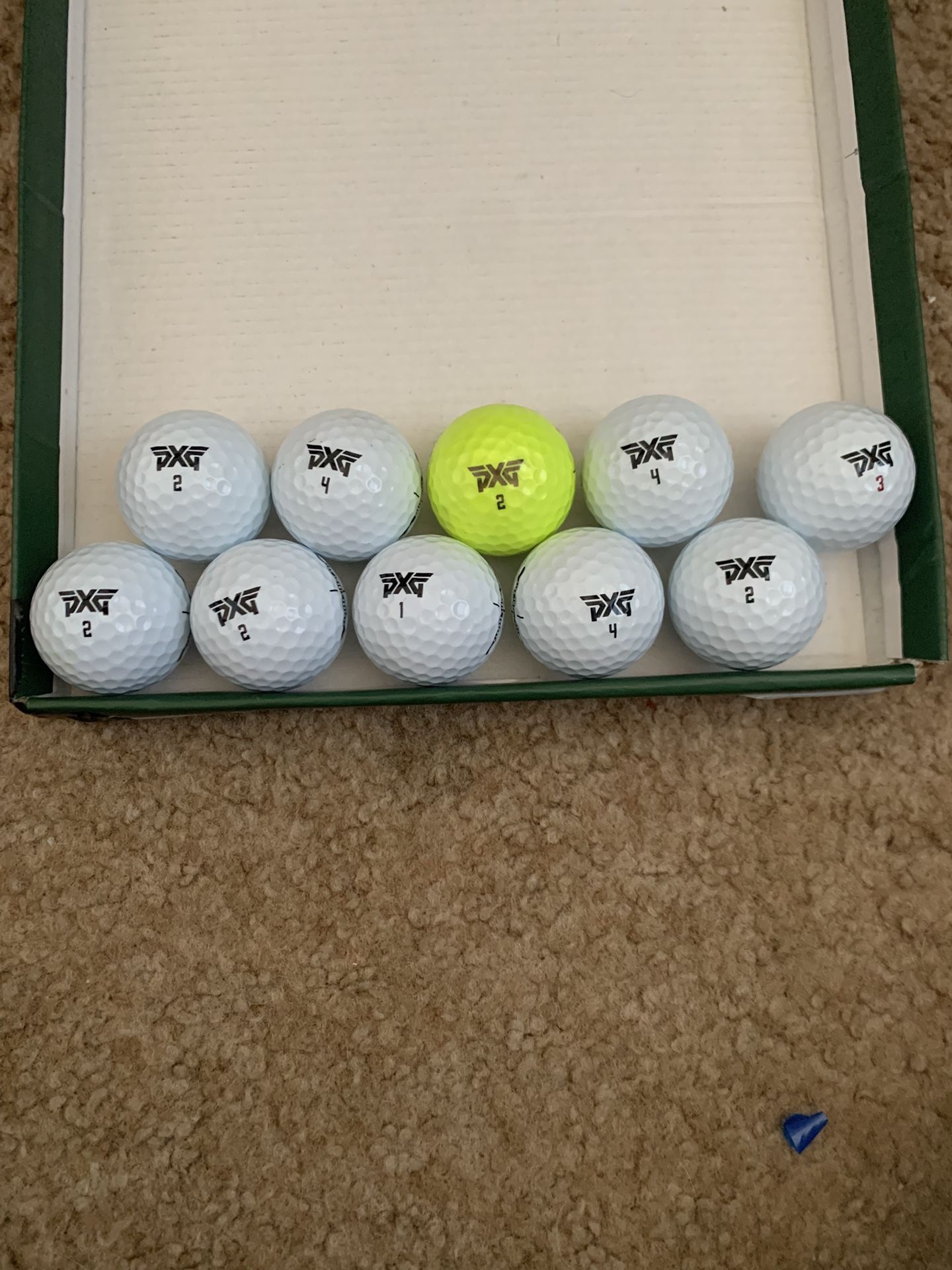 10 Golf Balls PXG In Good Condition.