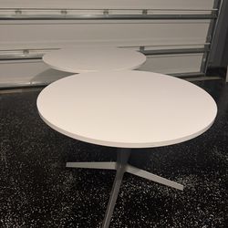 2 Round White Tables