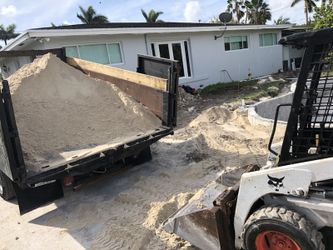 Bobcat demolition dumpsters chippin cutting general comstruction