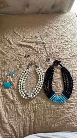 Brand new of beautiful 5 pieces necklace and 2 pieces of earrings for $60