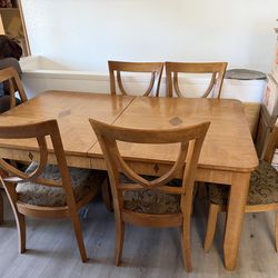 Table and 8 chairs with leaf 72x44