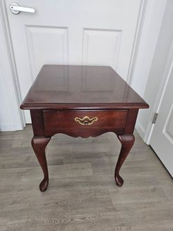 Thomasville solid  wood table with drawer storage