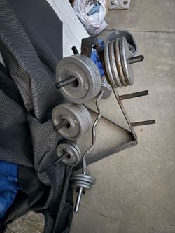 Weights standard ,olimpic rack  and curl https://offerup.co/faYXKzQFnY?$deeplink_path=/redirect/ the description below.