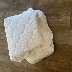 2 Twin Sized Mattress Protectors