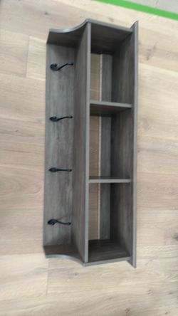 Entrance wall coat holder