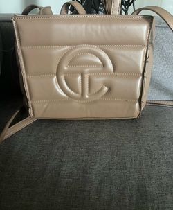 Small telfar shopping bag cream