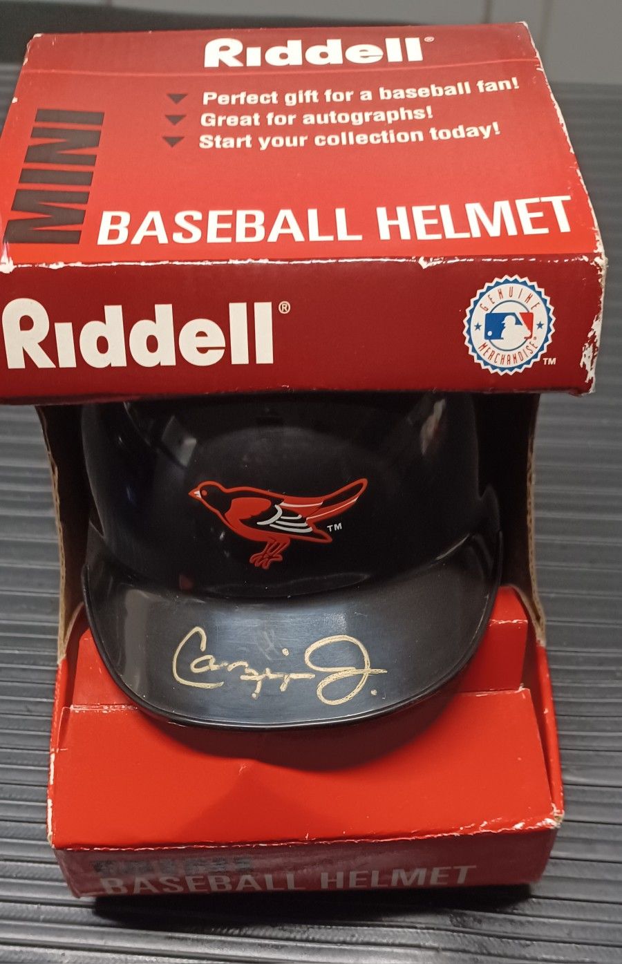 CARL RIPKEN JR AUTOGRAPHED RIDDLE MINI HELMET WITH COA